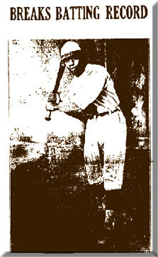 photograph of a newspaper article about a black baseball player breaking