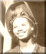 photo of an African American woman wearing a welding mask