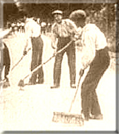 photo of African American men raking